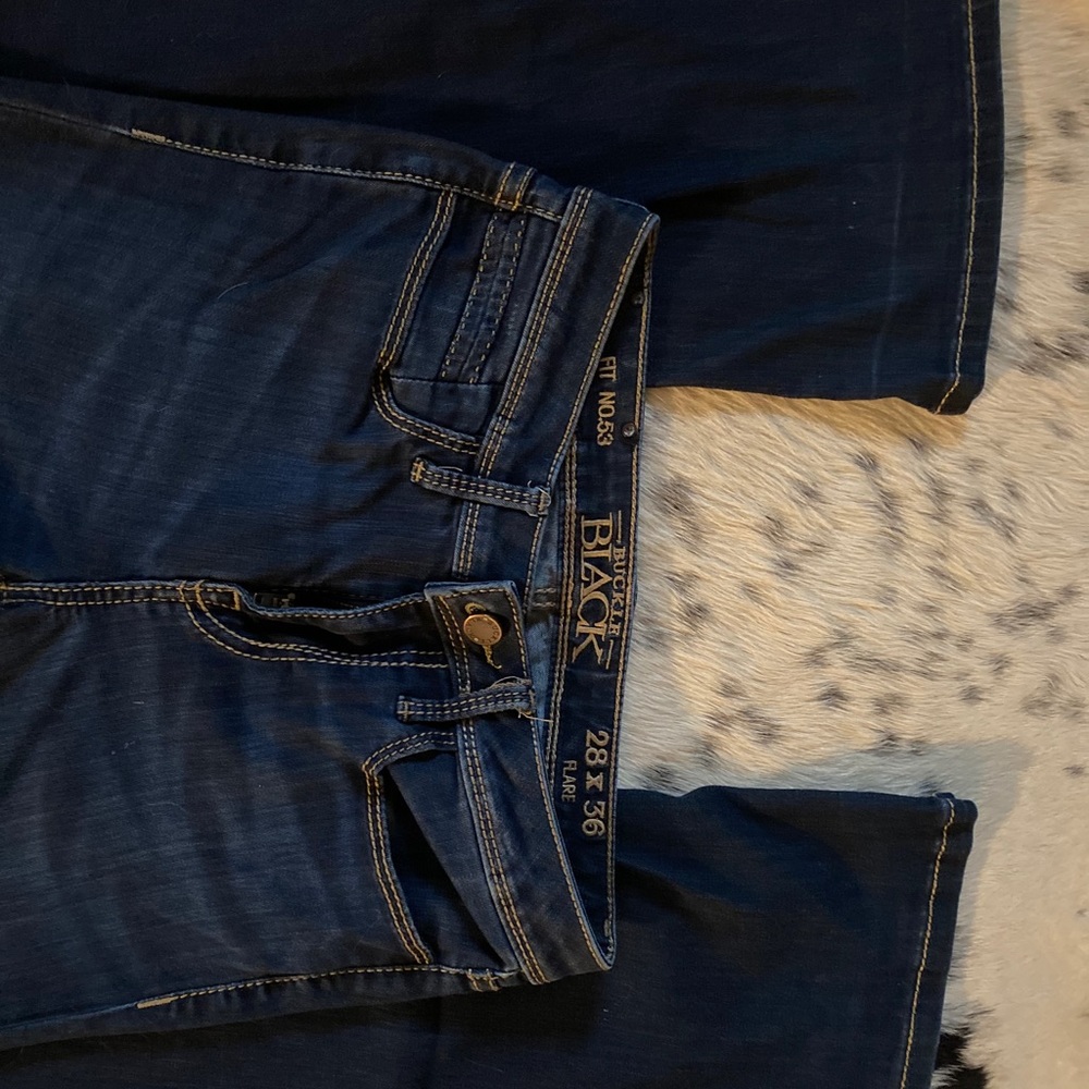 Buckle Black, dark wash. 28x36 (long)